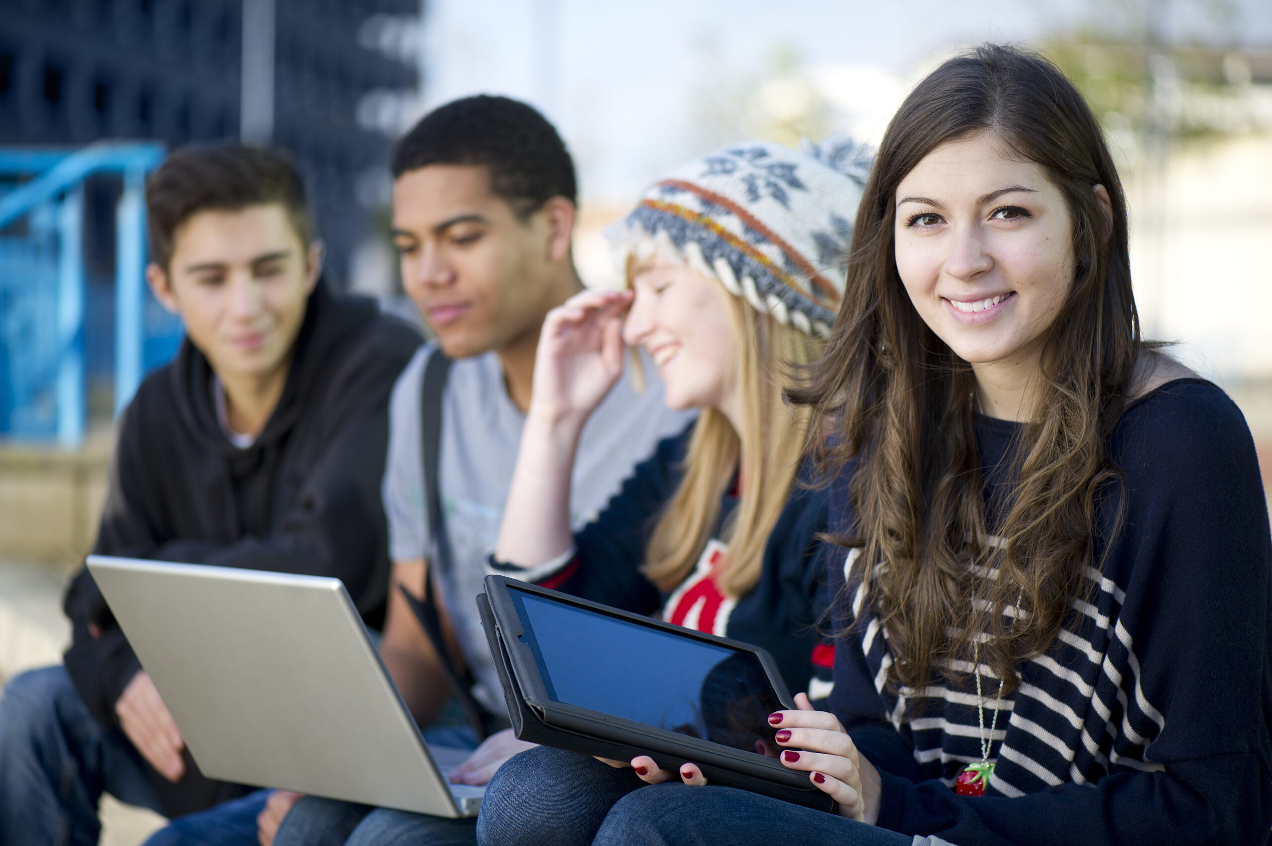 happy student with digital tablet